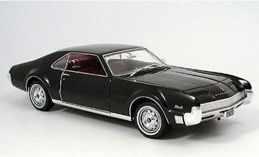 Diecast model cars Oldsmobile Toronado 1/18 Motormax black 1966 Oldsmobile Toronado 1/18 Motormax black 1966 diecast model cars