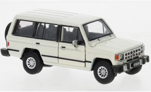 Diecast model cars Mitsubishi Pajero 1/64 BM Creations MK1 beige clair 1983 Mitsubishi Pajero 1/64 BM Creations MK1 beige clair 1983 diecast model cars