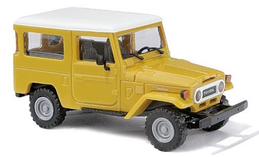 Diecast model cars Toyota Land Cruiser 1/87 Busch J4 yellow/white 1960 Toyota Land Cruiser 1/87 Busch J4 yellow/white 1960 diecast model cars