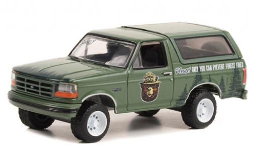 Diecast model cars Ford Bronco 1/64 Greenlight green Smokey Bear 1996 Ford Bronco 1/64 Greenlight green Smokey Bear 1996 diecast model cars