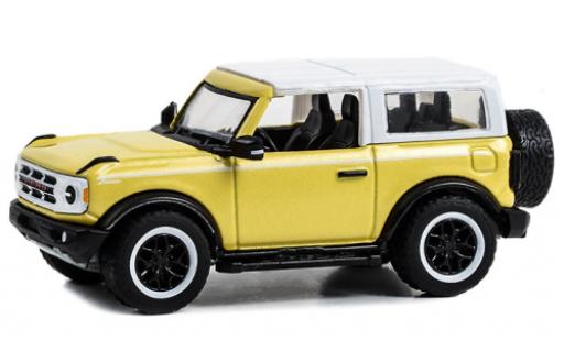 Diecast model cars Ford Bronco 1/64 Greenlight Heritage Edition yellow clair/white 2023 Ford Bronco 1/64 Greenlight Heritage Edition yellow clair/white 2023 diecast model cars