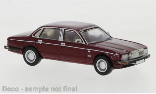 Diecast model cars Jaguar XJ 1/87 PCX87 40 metallic red 1986 Jaguar XJ 1/87 PCX87 40 metallic red 1986 diecast model cars